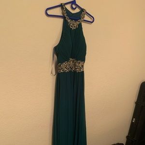 Beautiful teal, halter gown sz 16, used once